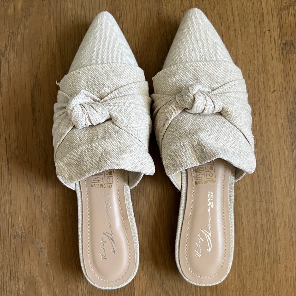 Pointy flat tan canvas mules size 6.5